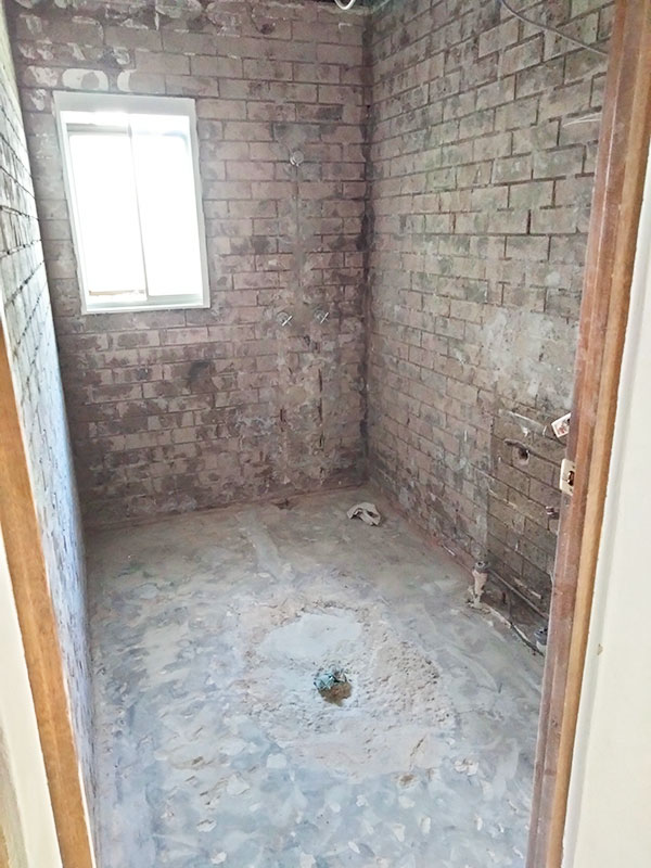 Bathroom after demolition stripout