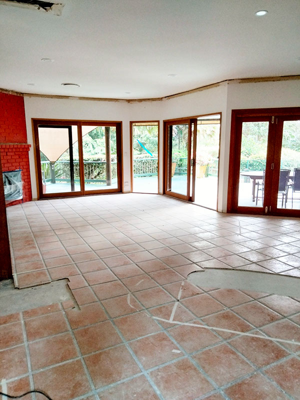 Tile flooring before demolition strip out