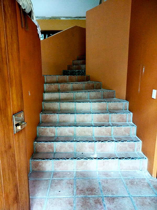 Stair tiles before demolition strip out